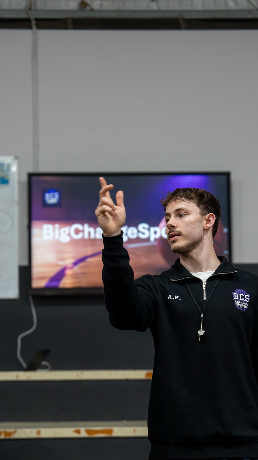 Coach leading a group discussion